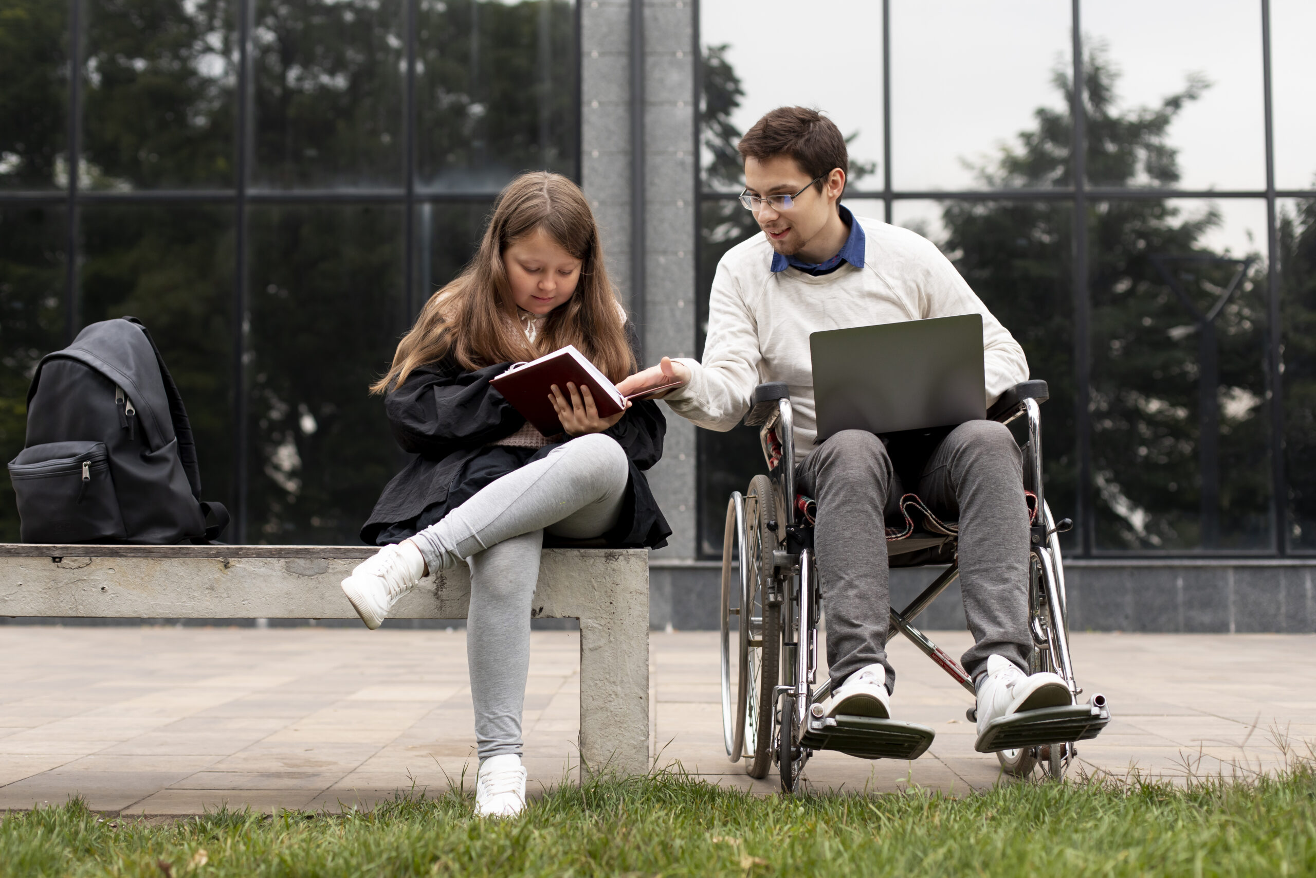 disabled-man-helping-girl-learn disabled-man-helping-girl-learn